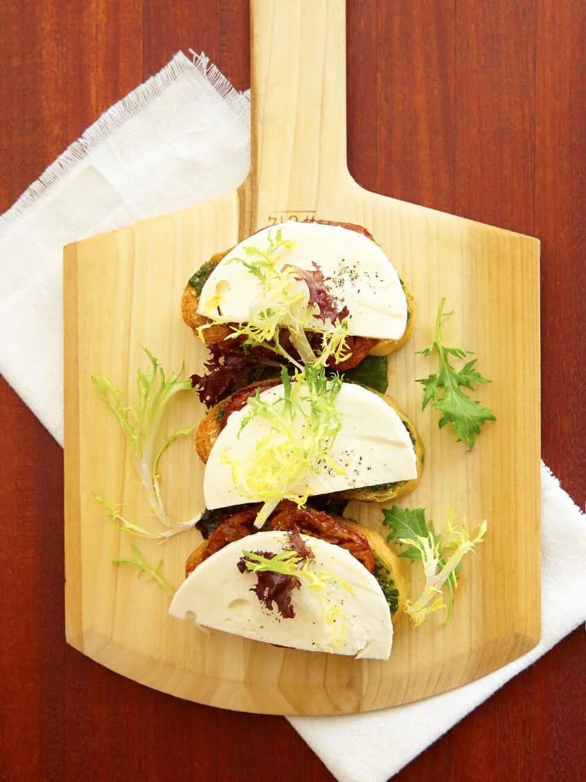 Fresh bruschetta plated at Tomatina